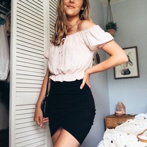 High waisted fitted skirt with cross front black